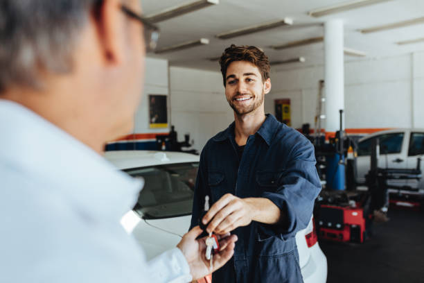 Car keys handed over before you donate your vehicle to charity
